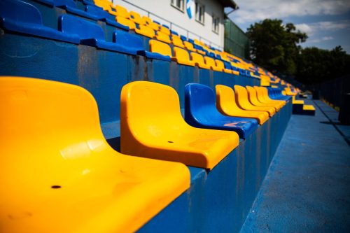 Empty stands with plastic colored seats Empty stands with plastic colored seats